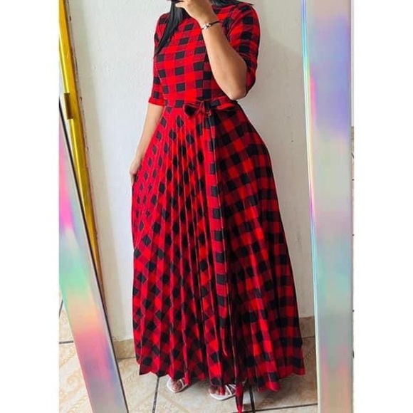 Dresses & Skirts - The dress is pleated with red and black checks and is not see-through